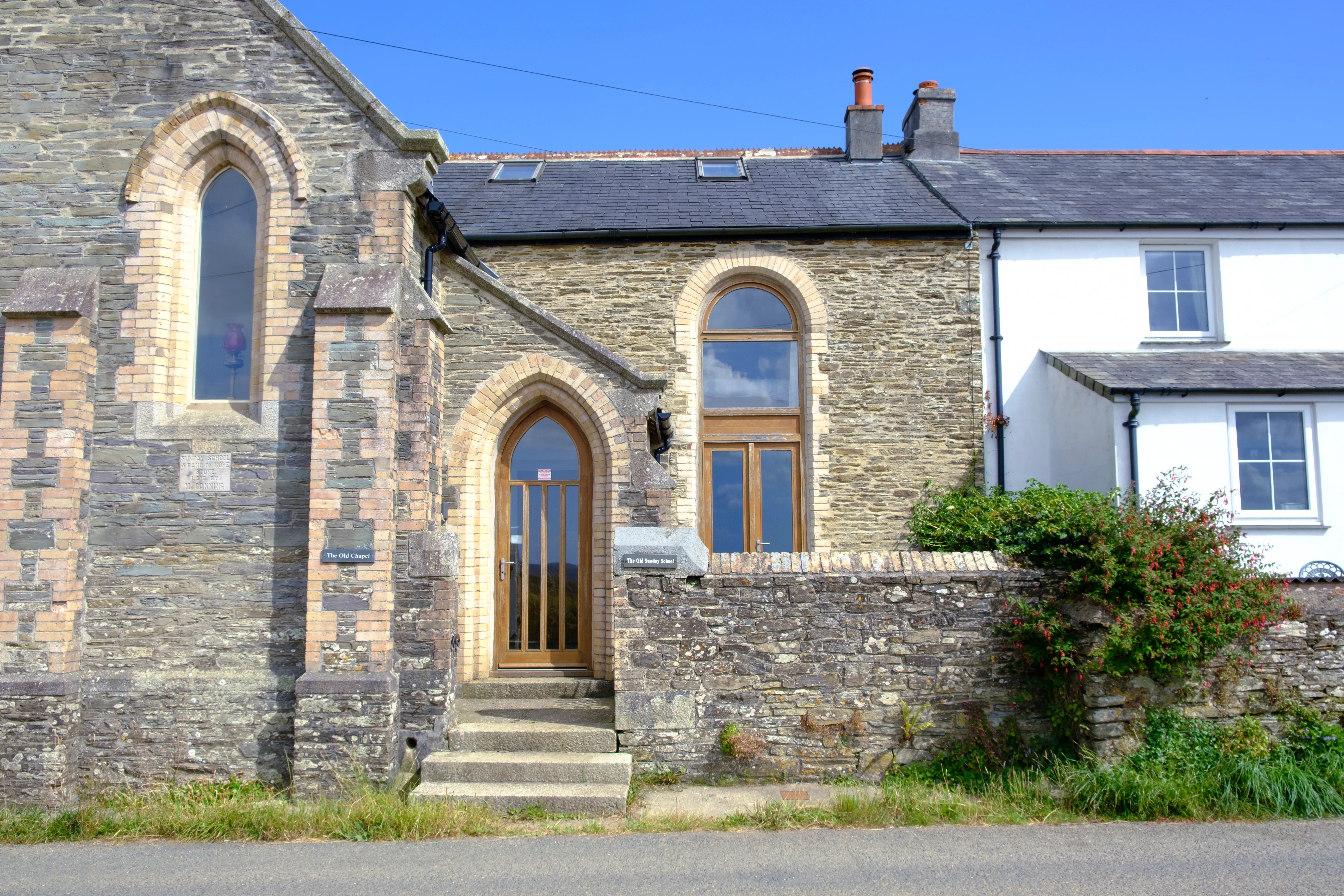 The Old Sunday School exterior with its original stone walls and oak door