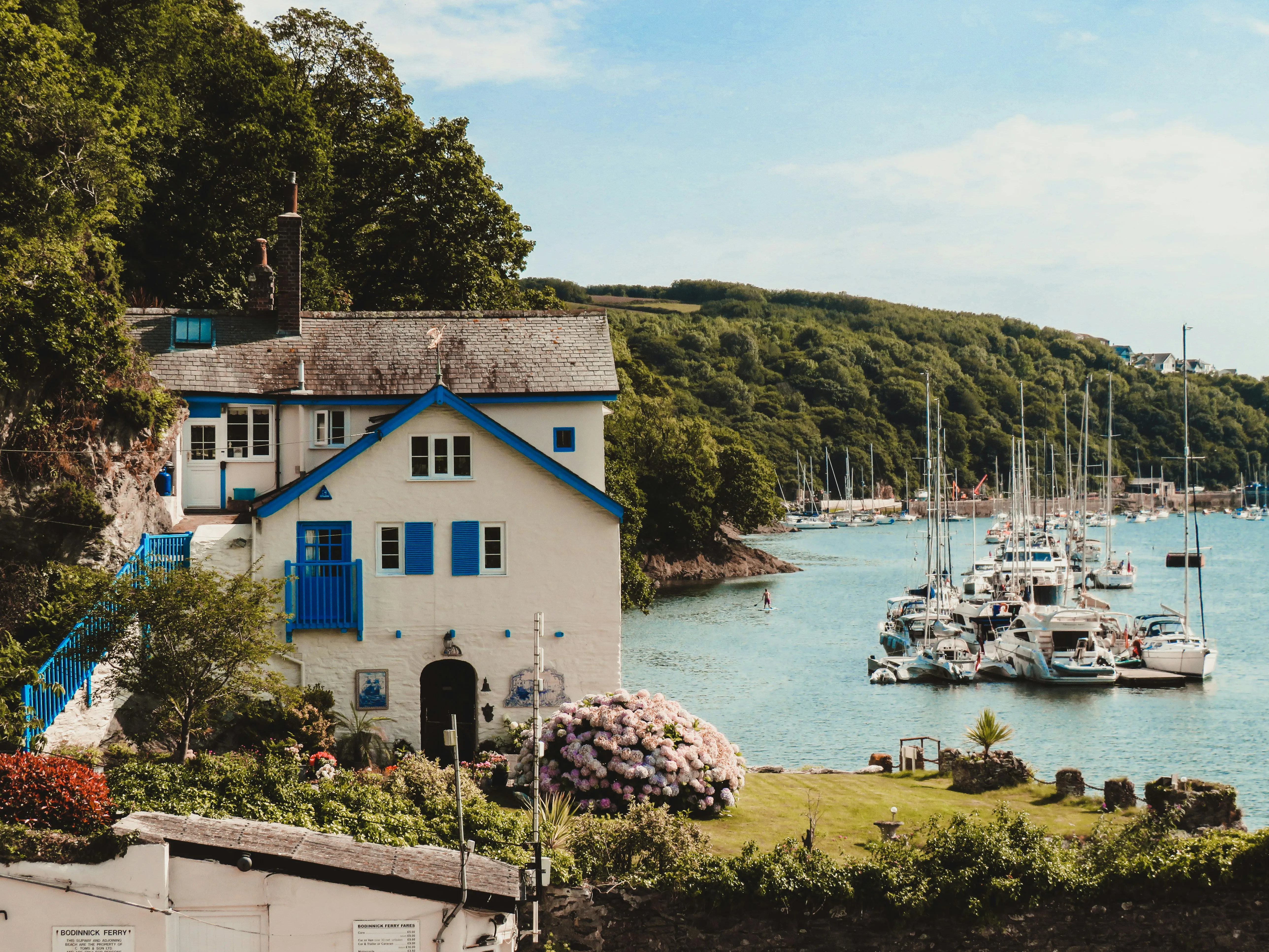A charming little house next to the water in Boddinick, with boats in the harbour